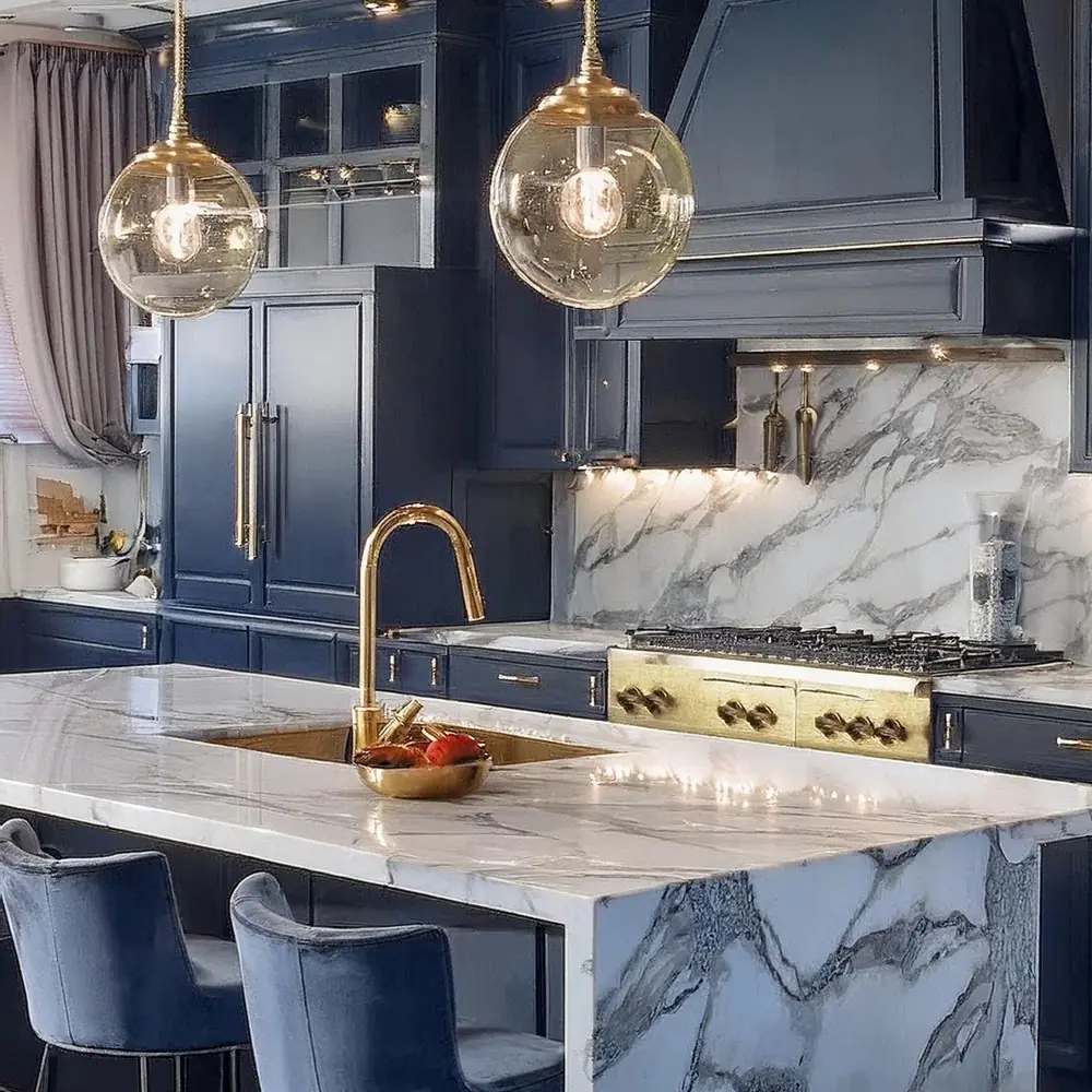 Blue custom kitchen with marble countertop and brass fixtures